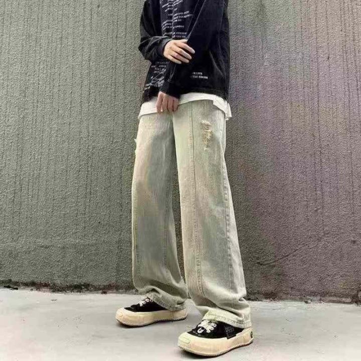 破洞男牛仔裤宽松高街