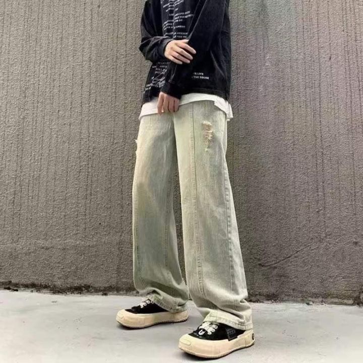 破洞男牛仔裤宽松高街