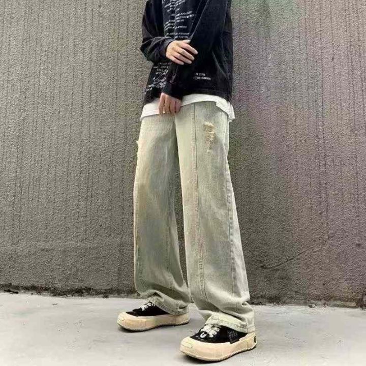 破洞男牛仔裤宽松高街