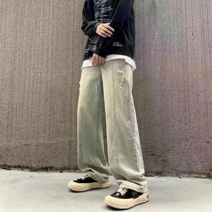 破洞男牛仔裤宽松高街