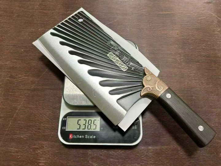 太阳纹锻打砍骨刀处理